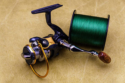 What are the types of fishing reels